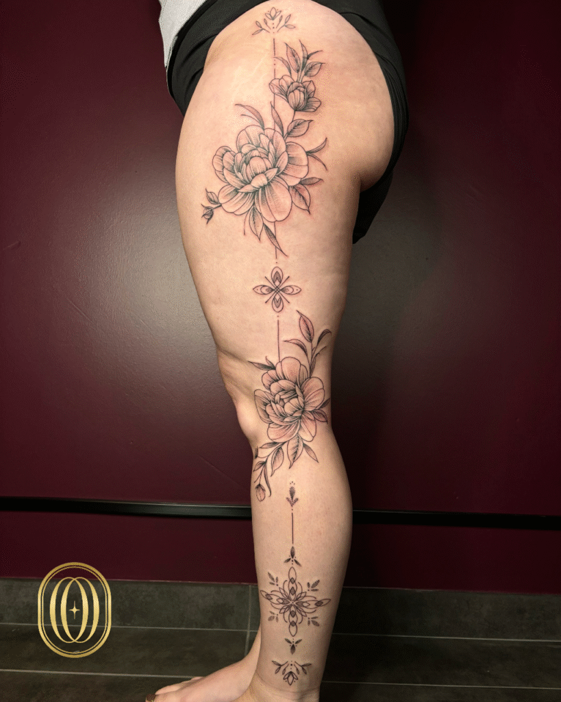Delicate fine line tattoo work with intricate details by Amber Moonchild.
